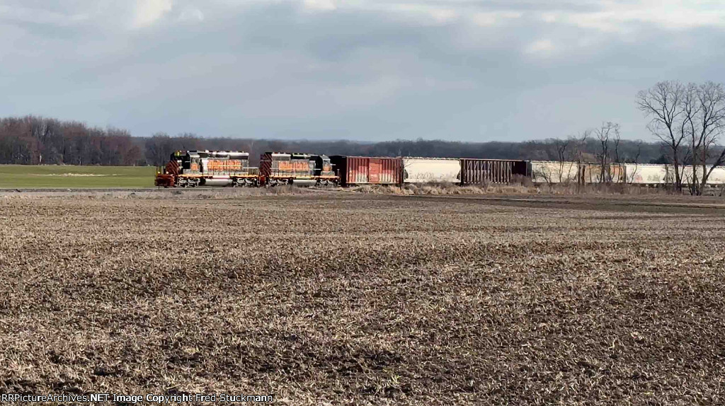 WE 7024 & 7016 out in farm country a bit west of Spencer.